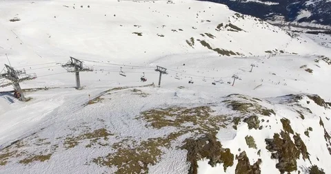 Aerial winter mountain landscape riders on pistes of alpine skiing resort 動画素材 106462653