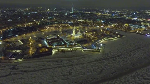 Aerial winter night flight over Peter and Paul Fortress. Russia snow Video stock 72485010