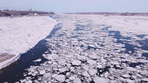 Aerial winter river landscape with floating broken ice Stock Footage 330315269
