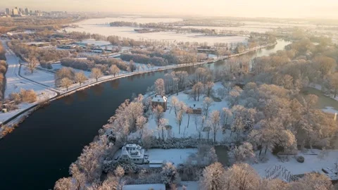 Aerial Winter View of Amstel River and Amstelpark Covered in Snow Stock Footage 325974597