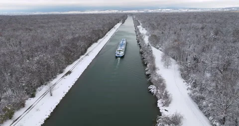 Aerial Winter View of Cargo Ship on Rhine River in Alsace, France Stock Footage 293140845