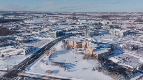 Aerial Winter View Over Derry Rd in Mississauga, Canada: Snowy Urban Landscape Vídeo Stock 331215495