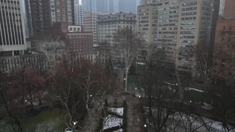 Aerial winter view of Rittenhouse Square in Philadelphia, showing snow-dusted Stock Footage 328961003