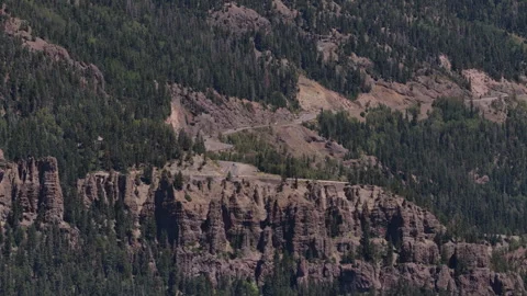 Aerial of Wolf Creek Pass in forested canyon in Mineral County Colorado Stock Footage 342747250