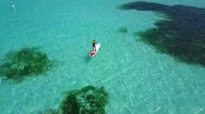 Aerial: Woman On Paddle Board In Maldives Stock Footage