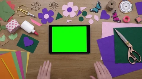 Aerial Of Woman Using Tablet Computer Surrounded By Art Equipment Stock Footage 79651542