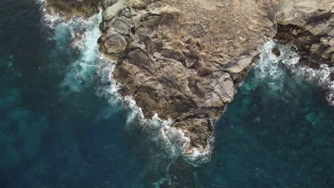 Aerial Zen: Turquoise Cliffs and Ocean Video stock 283271053