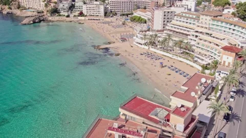 Aerial Zoom and Tilt Down Toward Cala Major Beach in Mallorca, Spain Vídeo Stock 346608385