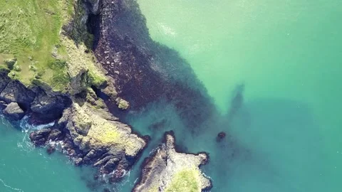 Aerial Zoom Out on Island with Beautiful Blue Ocean Stock Footage