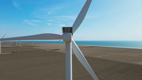 Aerial zoom out view of Wind Turbine Farm on agriculture fields in Ukraine. Stock Footage 150421211