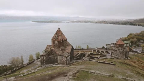 Aerial zoom in view of the Sevanavank Monastery and chapel overlooking famo.. Stock Footage 290068281