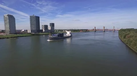 Aerials big ship at speed on river getting closer 25fps Stock Footage 57315504