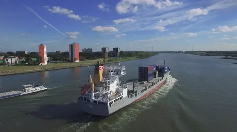 Aerials big ship at speed tracking over river 30fps Stock Footage 57315560