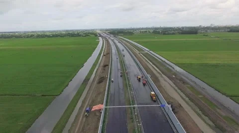 Aerials flight over highway under construction Stock Footage 57675094