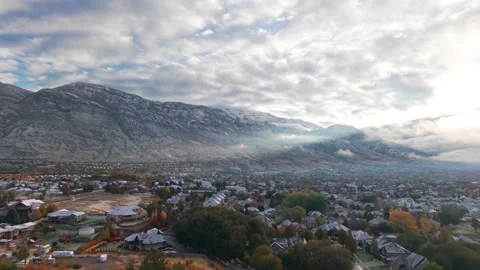Aerials in Low Clouds at Dawn along the Wasatch Front of the Rocky Mountains 스톡 동영상 294554789