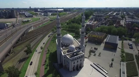 Aerials Rotterdam Circling a Mosque with skyline and river background Stock Footage