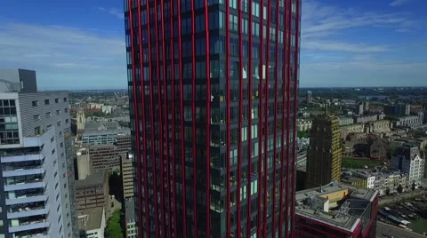 Aerials Rotterdam descending down skyscraper Stockbeeldmateriaal 55879656