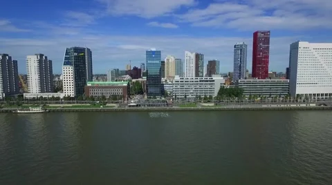 Aerials Rotterdam flight over river to city centre, river reflection in glass Stock Footage 55877831