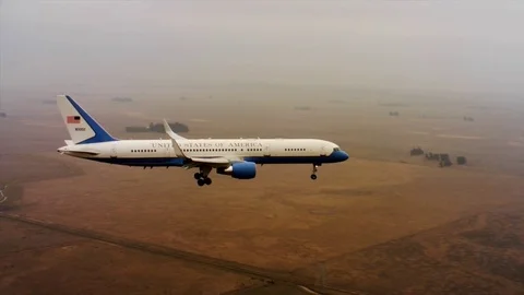 Aerials of the U.S. Air Force Air Mobility Command C32 coming in for a landing. Stock Footage 74812502