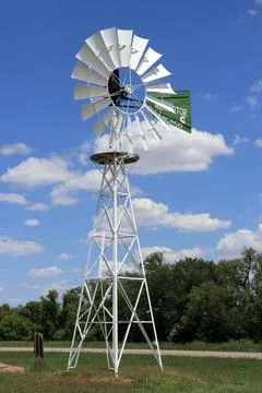 Aermotor windmill standing tall under a vibrant sky Stock Photos