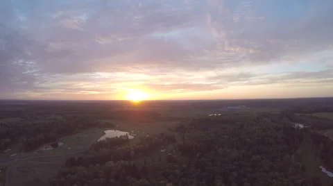 Aero Flight  Over sunset over the forest Stock Footage 64008248