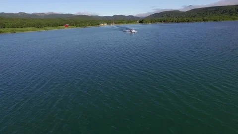 Aero flying over the boat. 스톡 동영상 77661982
