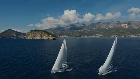 Aero shooting of two yachts in the open sea Stock Footage 81107125