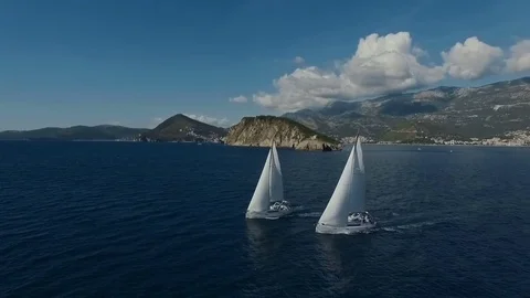 Aero shooting of two yachts in the open sea Stock Footage 81109112