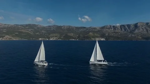 Aero shooting of two yachts in the open sea Stock Footage 81129435