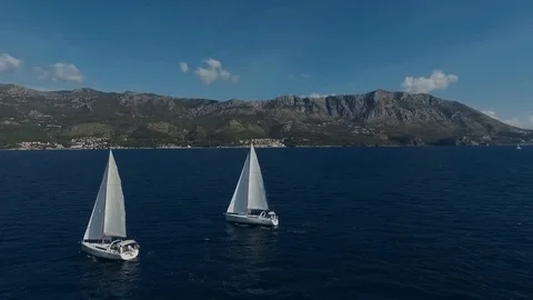 Aero shooting of two yachts in the open sea Stock Footage 81138095