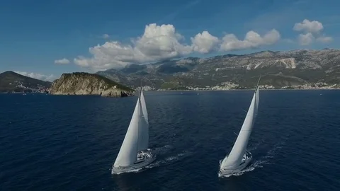Aero shooting of two yachts in the open sea Stock Footage 81222970