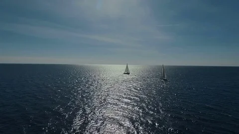 Aero shooting of two yachts in the open sea Stock Footage 81225923