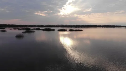 Aero video, reflection of the evening sun on the water Stock Footage 89399827