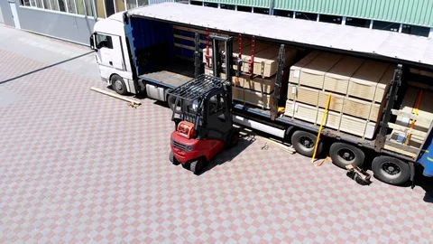 Aero, warehouses. unloading of the truck. unloading goods from the truck to the Stock Footage 112628315