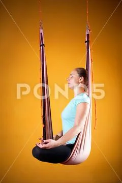 Aero yoga in hammock Stock Photos