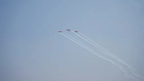 Aerobatic jets performing slow-motion maneuvers at the Aero India Air Show 2025 Stock Footage 304013521