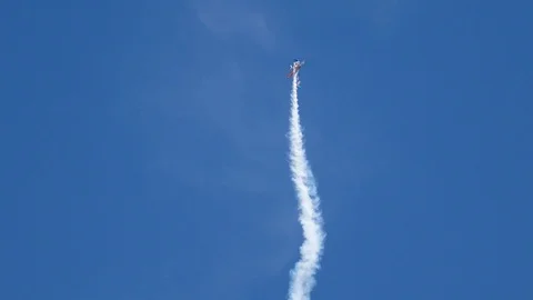 An aerobatic plane performs at the Tinker AFB Air Show Stock Footage 109347319