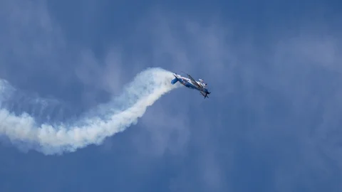 An aerobatic plane performs at the Tinker AFB Air Show Stock Footage 109347531