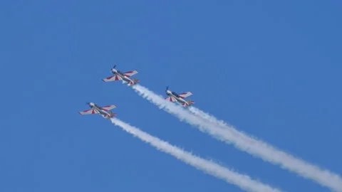 Aerobatic team performs maneuvers in formation showing skill of the pilots Stock Footage 167909444