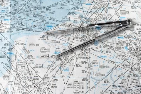 Aeronautical navigation chart and a pair of compasses Stock Photos