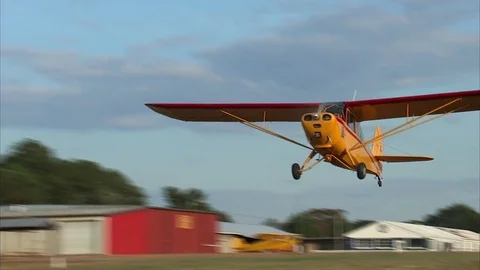 Aeronca Champ Take Off Grass Strip Vídeos de archivo 79865434