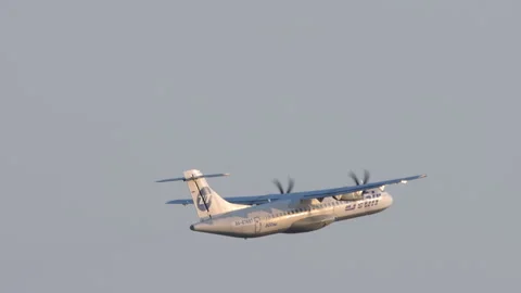 Aeroplane of ATR 72 takeoff, slow motion Stock Footage 303502502