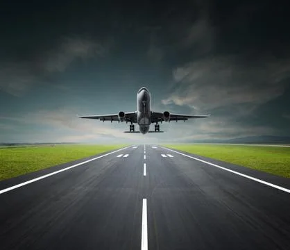 Aeroplane on a cloudy day Stock Photos