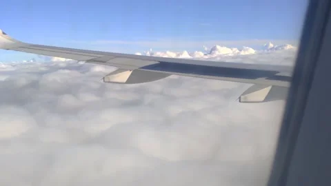Aeroplane entering into dense clouds view from plane window Stock-Footage 146707015