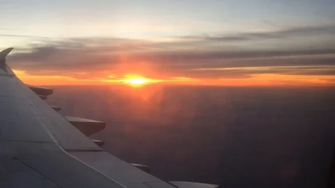 Aeroplane flight clouds sunset Video stock 105666638