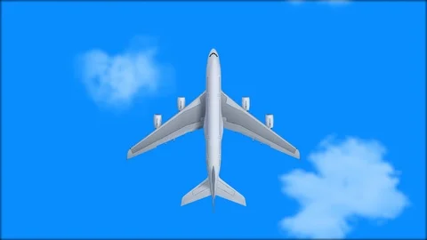 Aeroplane Flying Through Clouds in the blue sky Stock Footage 121715354
