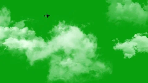 An Aeroplane passing through white clouds in the sky Stock Footage 246038253