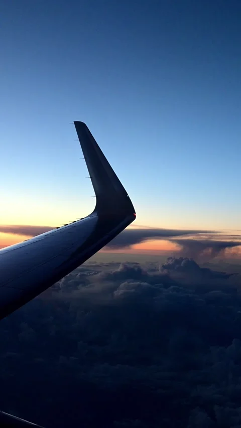 Aeroplane wing during sunset 스톡 동영상 312196364