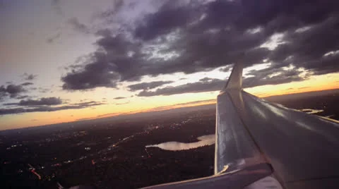 Aeroplane wing at sunset HD Stock Footage 26371744
