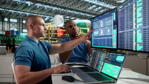 Aerospace Engineer Monitors Airplane Engines Using SCADA Software Stock Footage 335452489
